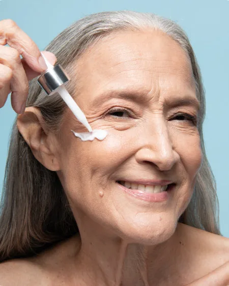 Woman using a My Derma Dream LED therapy facial device, AppLovin case study by Apt Digital